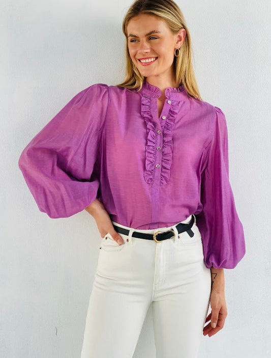 Ruffle detail purple blouse